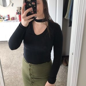 Divided black long sleeve crop top